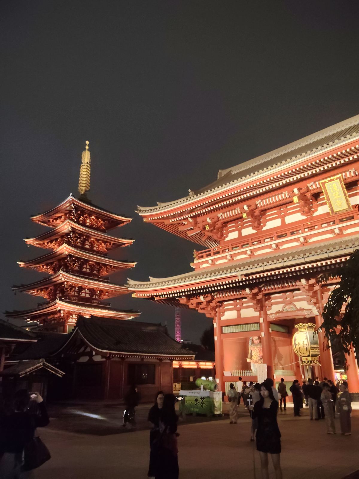 Hozomon gate and the five-storey pagoda of Senso-ji lit up at night