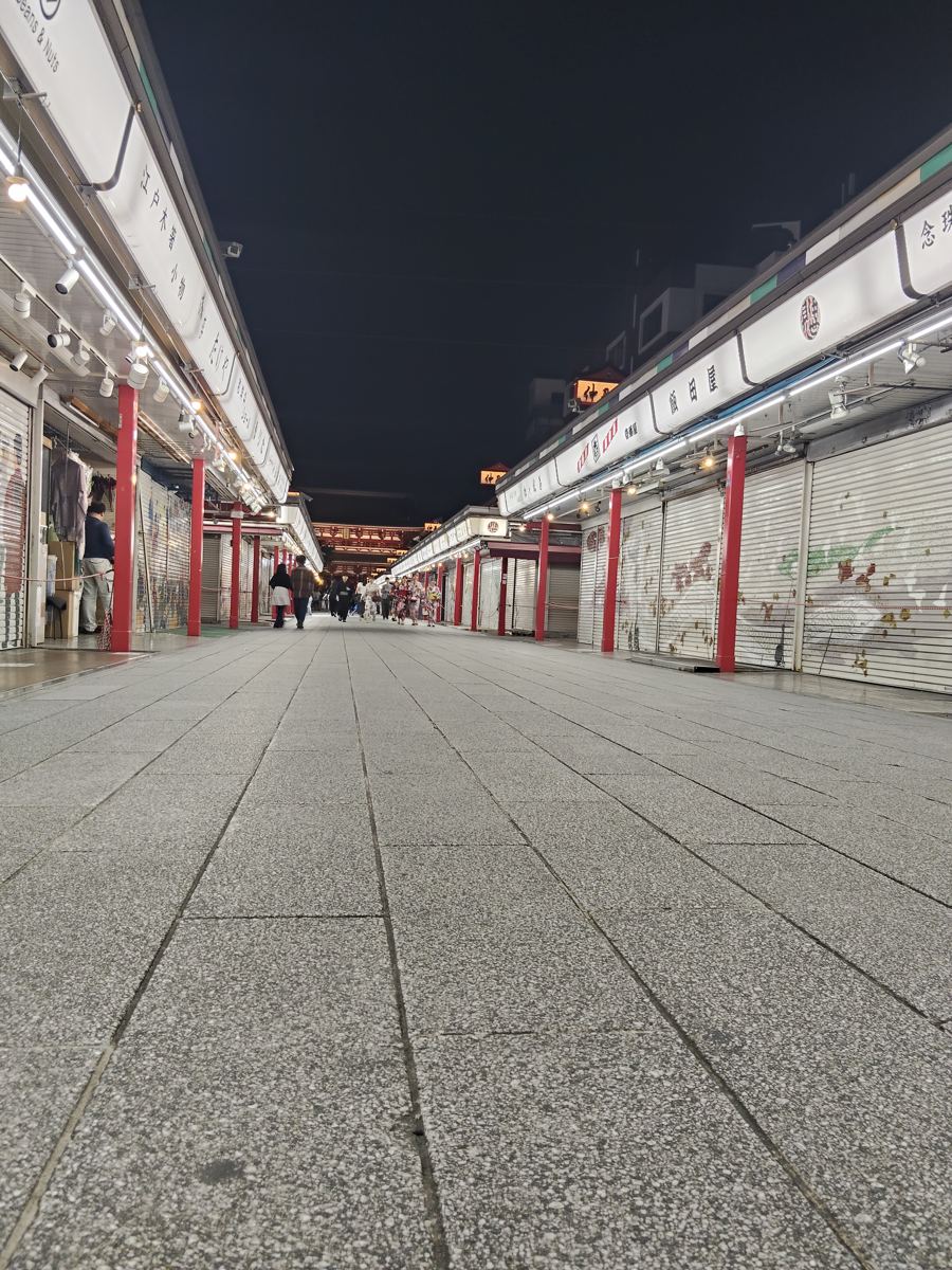 Nakamise shopping street at night, shutters down and lit